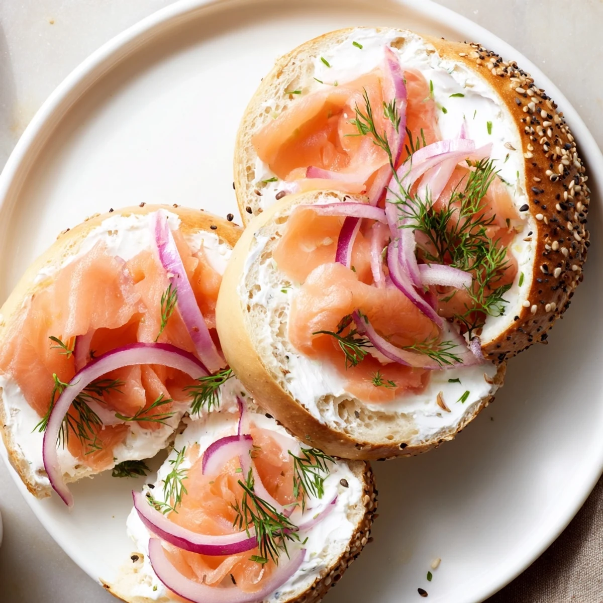 A perfectly toasted bagel with cream cheese, smooth and creamy, ready for a delicious breakfast.